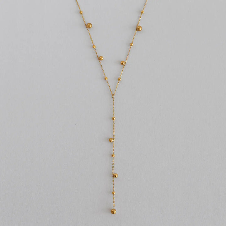 Klara - Lariat Necklace with Gold Dots Stainless Steel Timi of Sweden